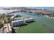 Waterfront condominium complex on the bay boasting stunning views, private boat slips, and community amenities at 7922 Sailboat Key S Blvd # 105, South Pasadena, FL 33707