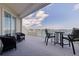 Outdoor patio area with furniture and a beautiful water view at 7922 Sailboat Key S Blvd # 105, South Pasadena, FL 33707