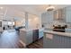 Open kitchen design with stainless appliances and a view into the living space at 7922 Sailboat Key S Blvd # 105, South Pasadena, FL 33707