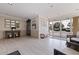 Spacious lobby area with tile flooring, seating, and natural light at 7922 Sailboat Key S Blvd # 105, South Pasadena, FL 33707