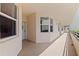 The walkway in front of the condo is tiled and leads to the front door at 7922 Sailboat Key S Blvd # 105, South Pasadena, FL 33707
