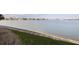 Expansive waterfront view showcasing a picturesque waterfront and sidewalk perfect for enjoying waterfront vistas at 7922 Sailboat Key S Blvd # 105, South Pasadena, FL 33707