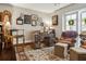 Office space featuring a rug, a desk with decor, a chair, and an exterior door at 805 Bannockburn Ave, Temple Terrace, FL 33617