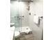Bathroom featuring a modern shower with a glass enclosure at 8565 W Gulf Blvd # 21S, St Petersburg, FL 33706