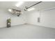 Large, clean garage with finished floors, utility systems, and plenty of open space at 907 E Okaloosa Ave, Tampa, FL 33604