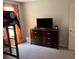 Bedroom featuring football themed decor and natural light at 9616 Lemon Drop Loop, Sun City Center, FL 33573