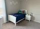 Bright bedroom with white trim and plush carpet at 9616 Lemon Drop Loop, Sun City Center, FL 33573