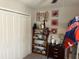 Closet with shelf, clothes, and sports decor at 9616 Lemon Drop Loop, Sun City Center, FL 33573