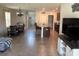 Living area featuring dining and a kitchen, creating a welcoming open-concept space for gatherings at 9616 Lemon Drop Loop, Sun City Center, FL 33573