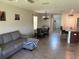 Open living room space featuring a dining area and seamlessly connects to a well-equipped kitchen at 9616 Lemon Drop Loop, Sun City Center, FL 33573
