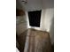 Laundry room with a washer and dryer and ceramic tiled floors. Needs some TLC at 10803 N Florence Ave, Tampa, FL 33612