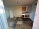 Interior view of a living space with dated appliances at 10803 N Florence Ave, Tampa, FL 33612