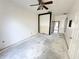 This bedroom has an open floor plan, ceiling fan, and room to relax at 1145 Riveredge Dr, Tarpon Springs, FL 34689