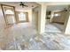 Bright living room with large windows and high ceilings at 1145 Riveredge Dr, Tarpon Springs, FL 34689
