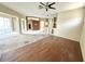 Spacious living area with hardwood floors and bright natural light at 1145 Riveredge Dr, Tarpon Springs, FL 34689