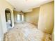 Spacious living room with ceiling fan and bright natural light at 1145 Riveredge Dr, Tarpon Springs, FL 34689