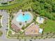 Aerial view of community pool, basketball court, and playground within a Primary-planned community at 11606 Kilkenny Coral Dr, Riverview, FL 33579