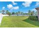 Large, fenced backyard perfect for entertaining and outdoor activities, with lush green grass at 11606 Kilkenny Coral Dr, Riverview, FL 33579