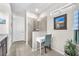 Clean bathroom with glass enclosed shower, convenient desk space, and modern fixtures at 11606 Kilkenny Coral Dr, Riverview, FL 33579