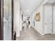 Inviting home foyer featuring light tile flooring, high ceilings, and neutral-colored walls at 11606 Kilkenny Coral Dr, Riverview, FL 33579