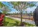 A fenced playground area with a variety of play equipment for children of all ages at 11606 Kilkenny Coral Dr, Riverview, FL 33579