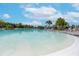 Enjoy the community zero-entry pool with beautiful clear water and views of the surrounding area at 11606 Kilkenny Coral Dr, Riverview, FL 33579