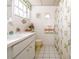 Bathroom with vanity, window, and shower curtain at 12303 Fieldstone Ln, Hudson, FL 34667