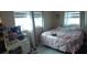 Cozy bedroom with natural light, offering a comfortable space at 12425 Ridge Rd, Largo, FL 33778