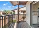 Scenic balcony view overlooking lush landscaping and nearby buildings, creating a serene outdoor space at 12804 Wedgewood Way # C, Hudson, FL 34667