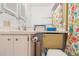 This bathroom features a toilet, sink and cabinet below at 12804 Wedgewood Way # C, Hudson, FL 34667