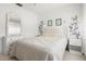 Bright bedroom offers a comfortable bed, fresh decor, and natural light at 12804 Wedgewood Way # C, Hudson, FL 34667