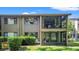 Two-story condo building with enclosed porches at 12804 Wedgewood Way # C, Hudson, FL 34667
