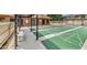Outdoor shuffleboard court with benches for seating at 12804 Wedgewood Way # C, Hudson, FL 34667