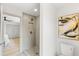 Contemporary bathroom featuring a tiled shower with niche and modern fixtures at 13211 111Th Ln, Largo, FL 33778