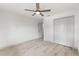Bedroom featuring ceiling fan, closet and view to hallway at 13211 111Th Ln, Largo, FL 33778