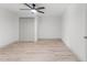 Bright bedroom featuring neutral walls, modern ceiling fan, and ample closet space at 13211 111Th Ln, Largo, FL 33778