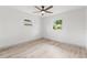 Clean, bright bedroom shows windows with exterior views at 13211 111Th Ln, Largo, FL 33778