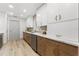 Kitchen featuring updated white and wood cabinets and stainless steel appliances at 13211 111Th Ln, Largo, FL 33778