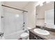 Bathroom featuring shower, vanity, and modern fixtures at 14233 Edinburgh Moor Dr, Wimauma, FL 33598