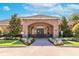 Community clubhouse with well-maintained landscaping and a welcoming entrance at 14233 Edinburgh Moor Dr, Wimauma, FL 33598
