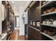 Walk-in closet with custom shelving and ample storage space for shoes and clothing, maximizing organization at 157 9Th N Ave, St Petersburg, FL 33701