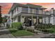 Charming two-story home with a beautiful landscaped yard and inviting front porch and balcony at 157 9Th N Ave, St Petersburg, FL 33701