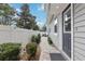 Home's entrance featuring a landscaped walkway and partial view of the home at 157 9Th N Ave, St Petersburg, FL 33701