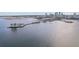 Scenic aerial view of a pier extending into the water, with a city skyline backdrop at 157 9Th N Ave, St Petersburg, FL 33701