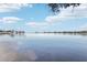 Beautiful waterfront view with a yacht docked and a clear blue sky reflecting on the water at 157 9Th N Ave, St Petersburg, FL 33701