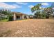 Expansive backyard offering ample space for outdoor activities and landscaping at 15810 Starling Water Dr, Lithia, FL 33547