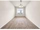 Bright dining room with large window and smooth carpet for comfort at 15810 Starling Water Dr, Lithia, FL 33547