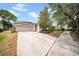 Well-maintained single Gathering home with a long driveway and manicured landscaping at 15810 Starling Water Dr, Lithia, FL 33547