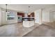 Stylish kitchen features dark wood cabinets, stainless steel appliances, and an island at 15810 Starling Water Dr, Lithia, FL 33547