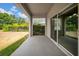 Covered patio with concrete flooring and a view of the backyard at 15810 Starling Water Dr, Lithia, FL 33547